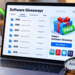 Software giveaway archive with 2025 records and a 2026 update on a laptop screen